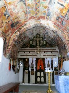 The fresco covered walls and ceilings inside the chapel